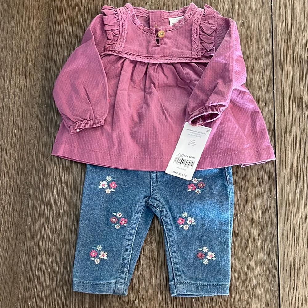 Brand new outfit from Carters. Size Newborn!